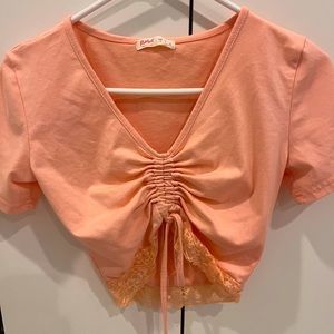 I am selling a pink Romwe crop top